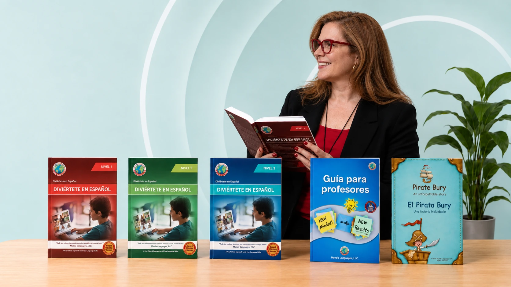 Despina Kozulcali sonriendo con sus lentes rojos, leyendo Diviértete en Español Nivel 1 junto a su colección completa de libros
